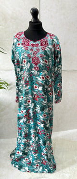 Little girl wearing Amani's burgundy floral mukhawar dress