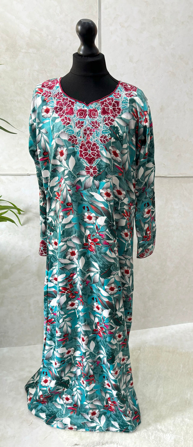Little girl wearing Amani's burgundy floral mukhawar dress