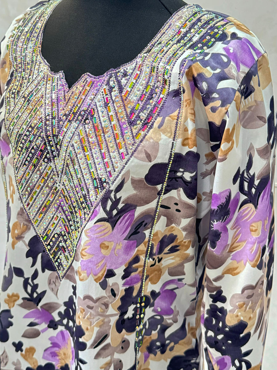 Lilac mukhawar dress showing the embroidered neckline and crystal detail