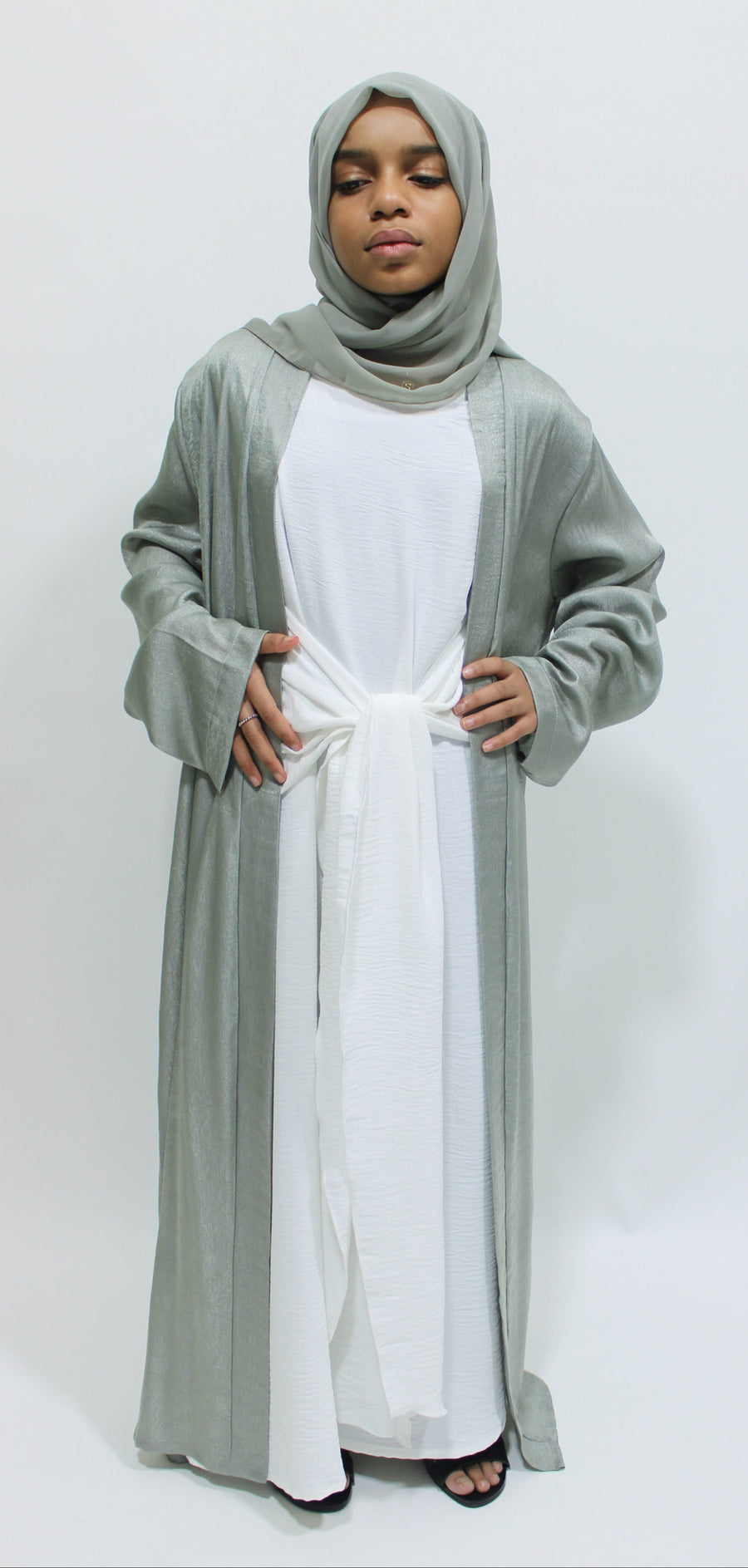 Sage green open jacket abaya showing the shimmer-textured fabric