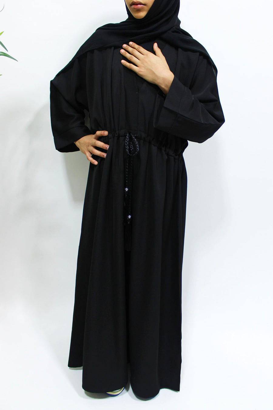 Black girls' abaya showing the lace border detail