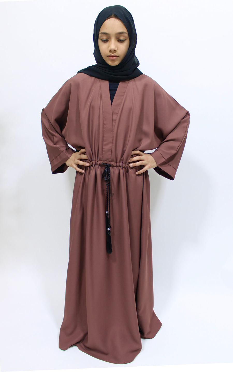 Dark blush girls' abaya showing the black lace border