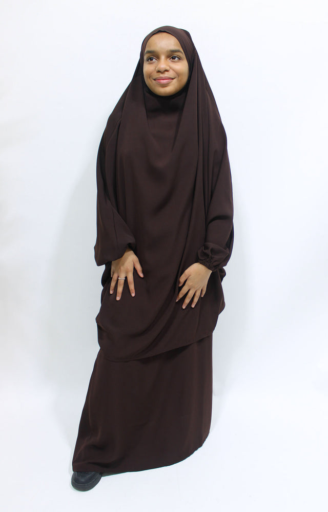 Girl wearing Amani's dark brown jilbab and skirt set with half-jilbab top