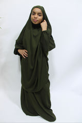Girl wearing Amani's olive green jilbab and skirt set with half-jilbab top