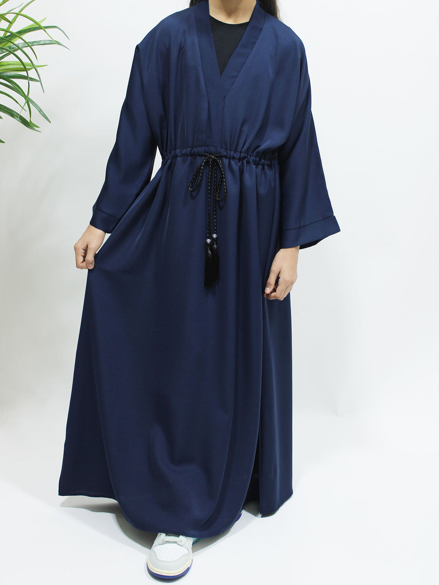 Drawstring rope belt on the navy blue girls' abaya