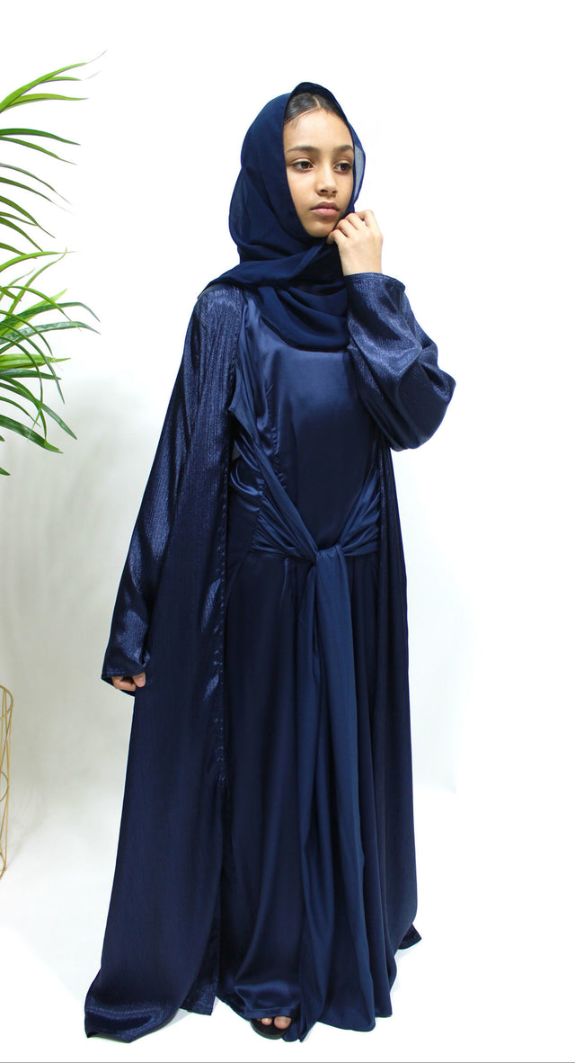 Girl wearing Amani's navy blue open jacket abaya set with inner dress and scarf