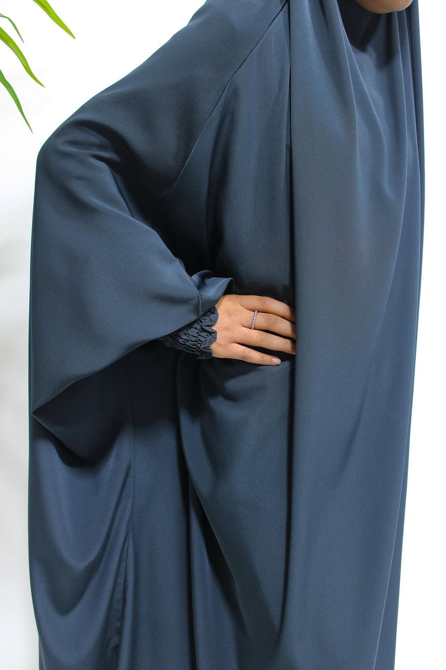 Full-length view of Amani's dark grey girls' ruched cuffs jilbab