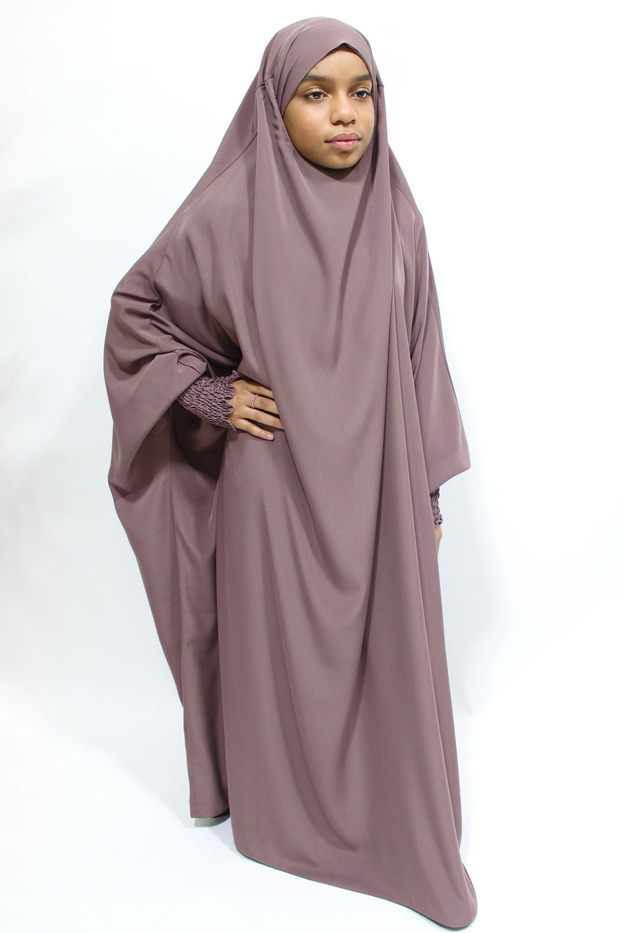 Girl wearing Amani's desert taupe ruched cuffs full jilbab