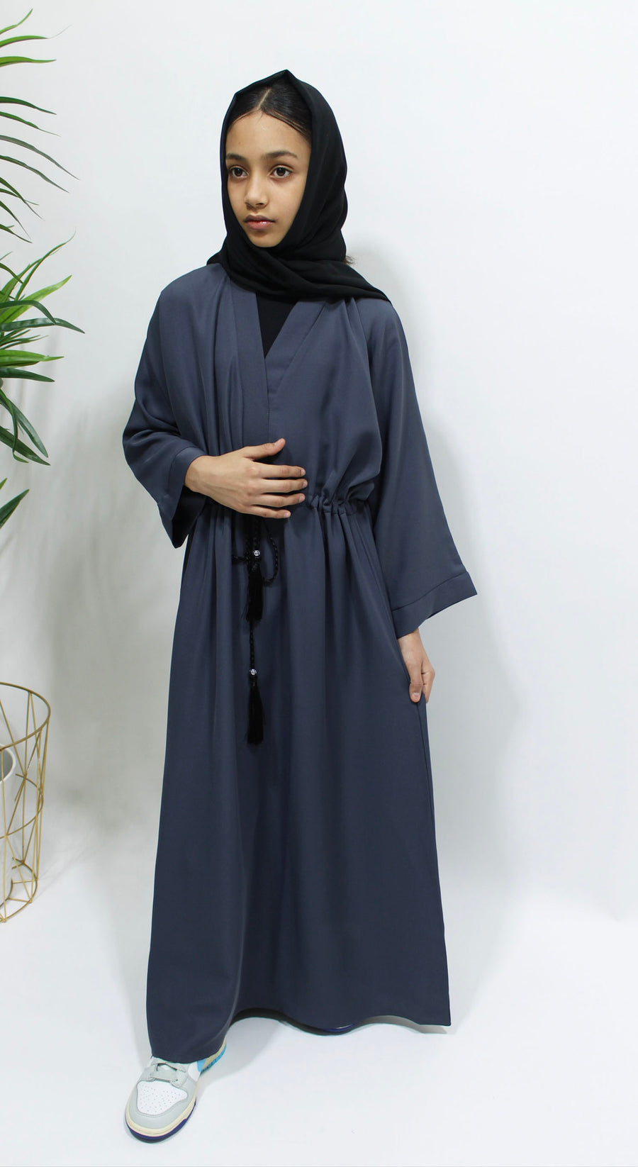 Slate grey girls' abaya showing the black lace border