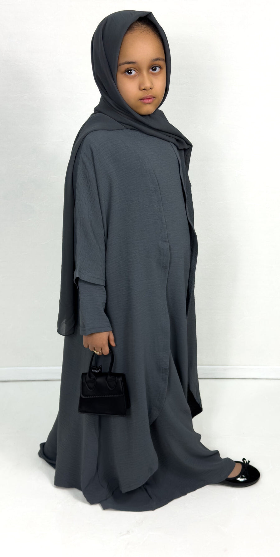 Girls' grey three piece abaya set showing long sleeve abaya