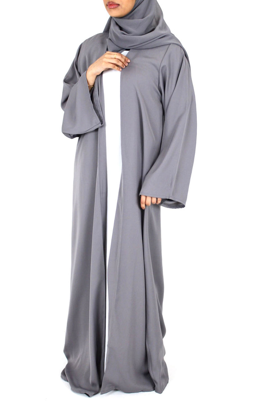 Fluid drape of the grey duster open abaya