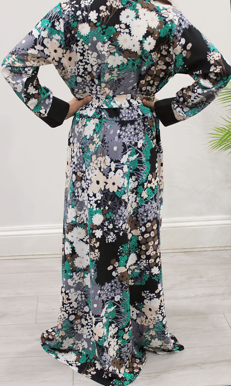 Grey floral kids maxi dress showing the full umbrella-cut skirt