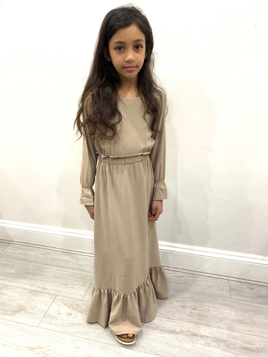 Soft viscose drape of the Haya sand girls' maxi dress