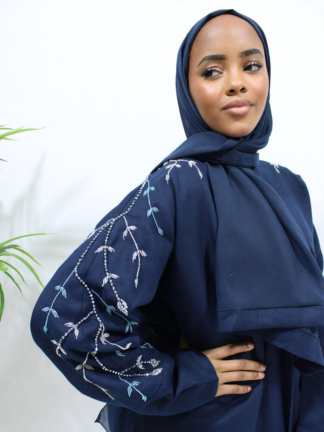Navy blue linen blend bisht abaya worn open with matching hijab, front view