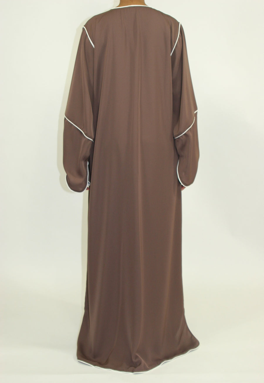 Light brown A-line maxi jacket showing chest buttons