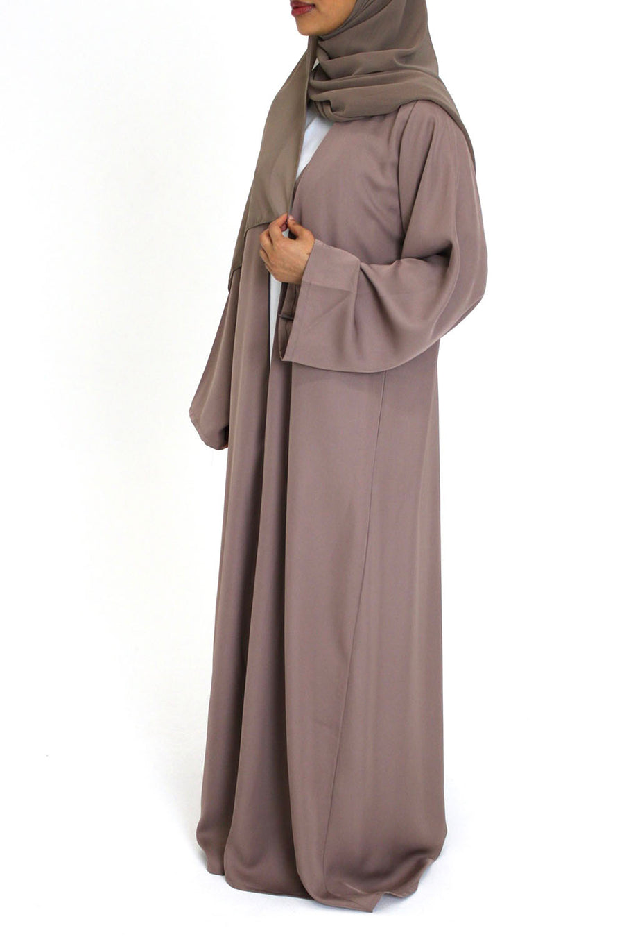 Full-length fluid drape of the mocha duster open abaya