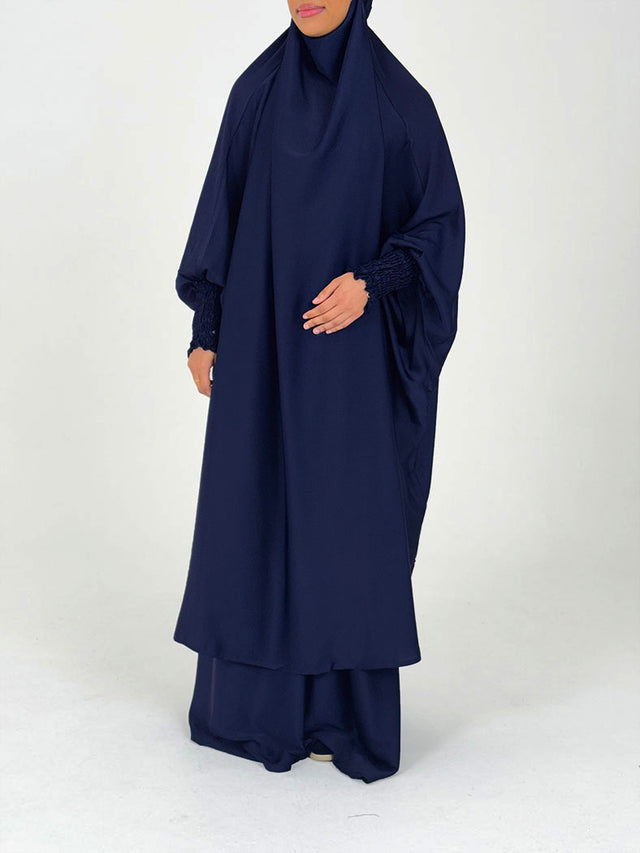 Navy blue two-piece jilbab set, overhead top and maxi skirt, front view