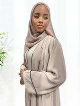Nude double layer open abaya with black embellished piping and matching hijab, front view