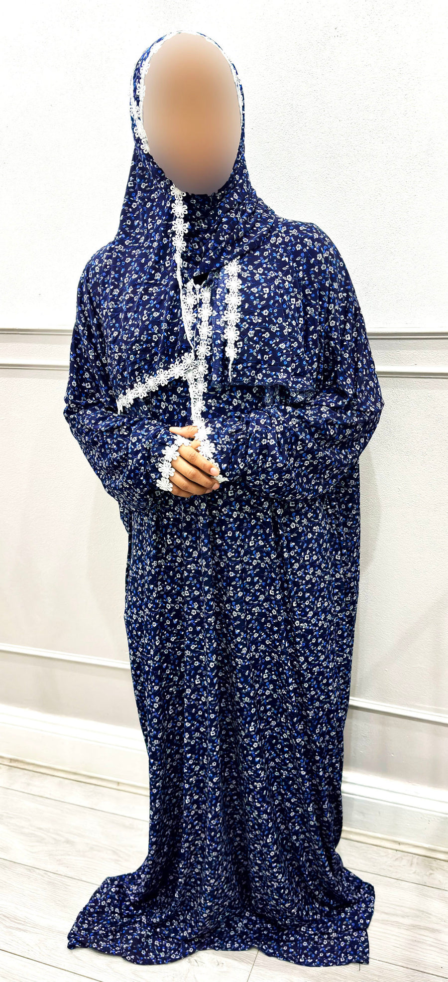 Navy dainty floral prayer dress showing the lace-trim attached scarf