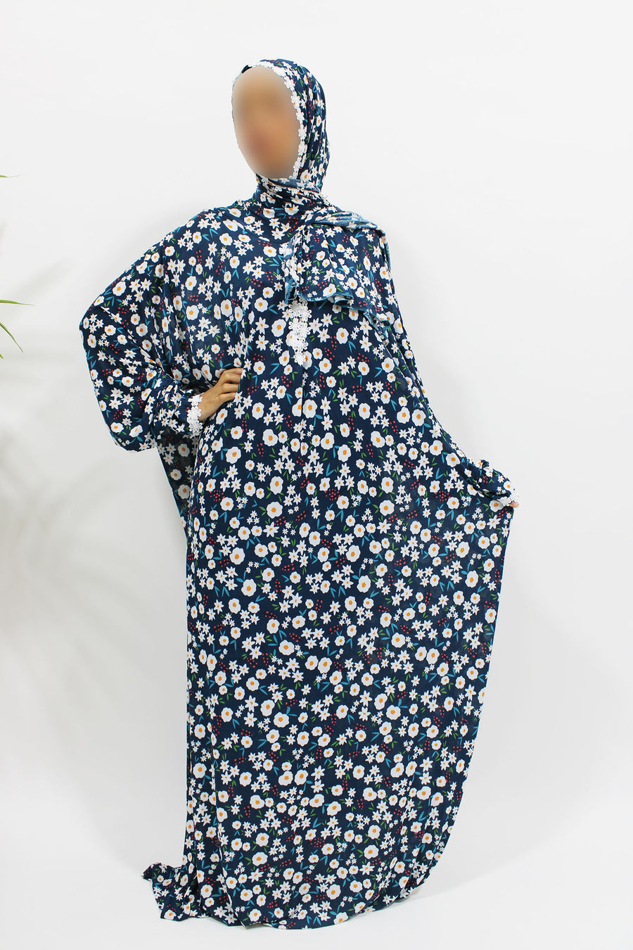 Navy floral prayer dress showing the attached hijab and full length