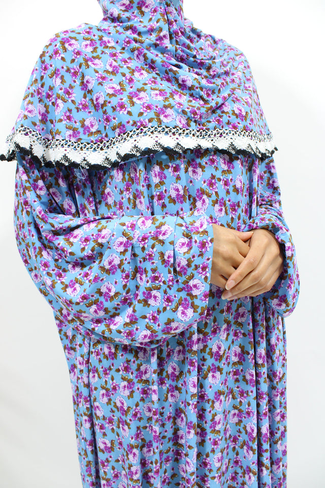 Light blue floral slip-on jersey prayer dress with attached hijab, front view