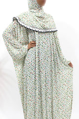 White floral slip-on jersey prayer dress with attached hijab, front view
