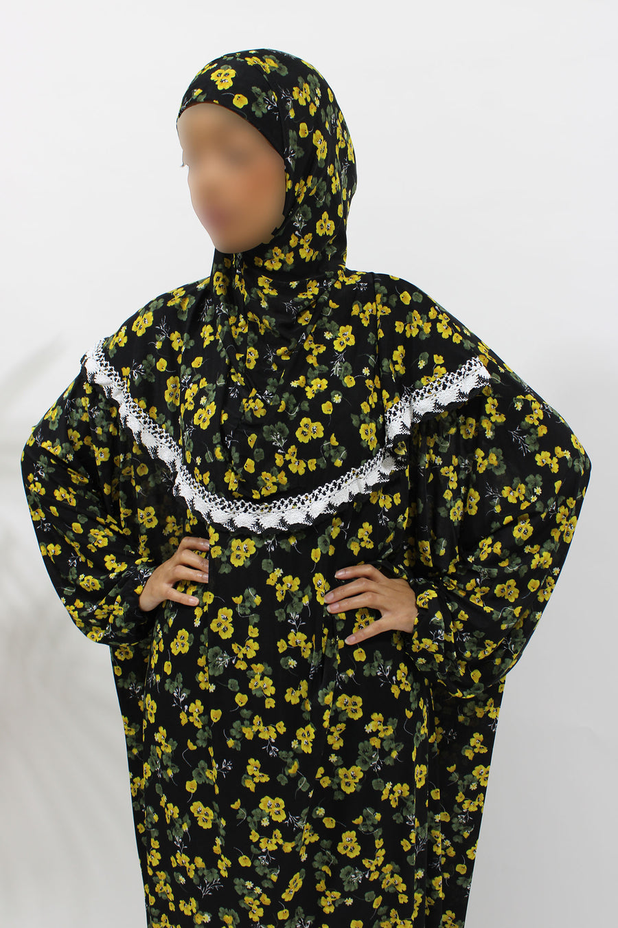 Yellow floral slip-on jersey prayer dress with attached hijab, front view