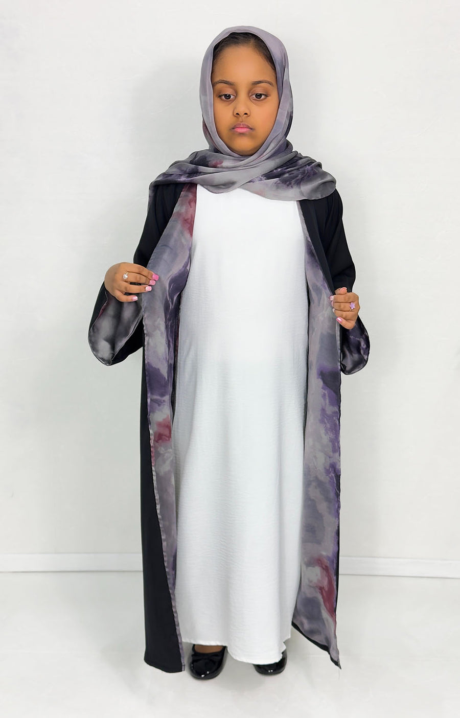 Girls' open abaya showing purple watercolour satin chiffon lining