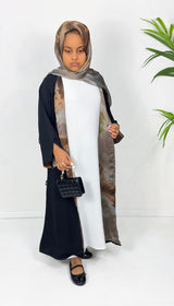 Girls' black open abaya with taupe satin chiffon lining, front view