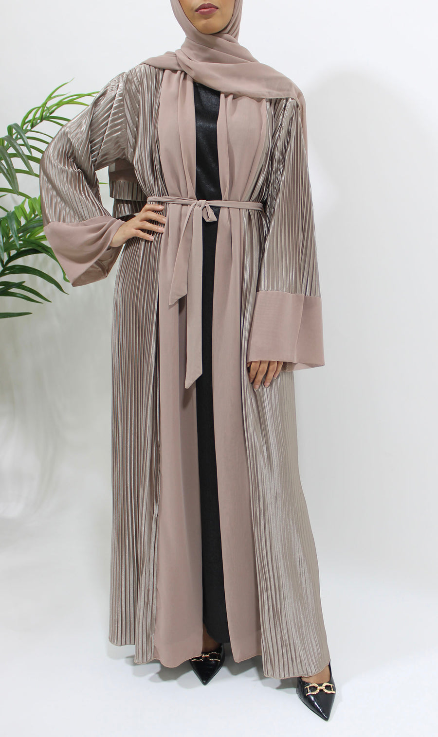 Full-length view of the pink nude pleated satin open abaya with matching hijab
