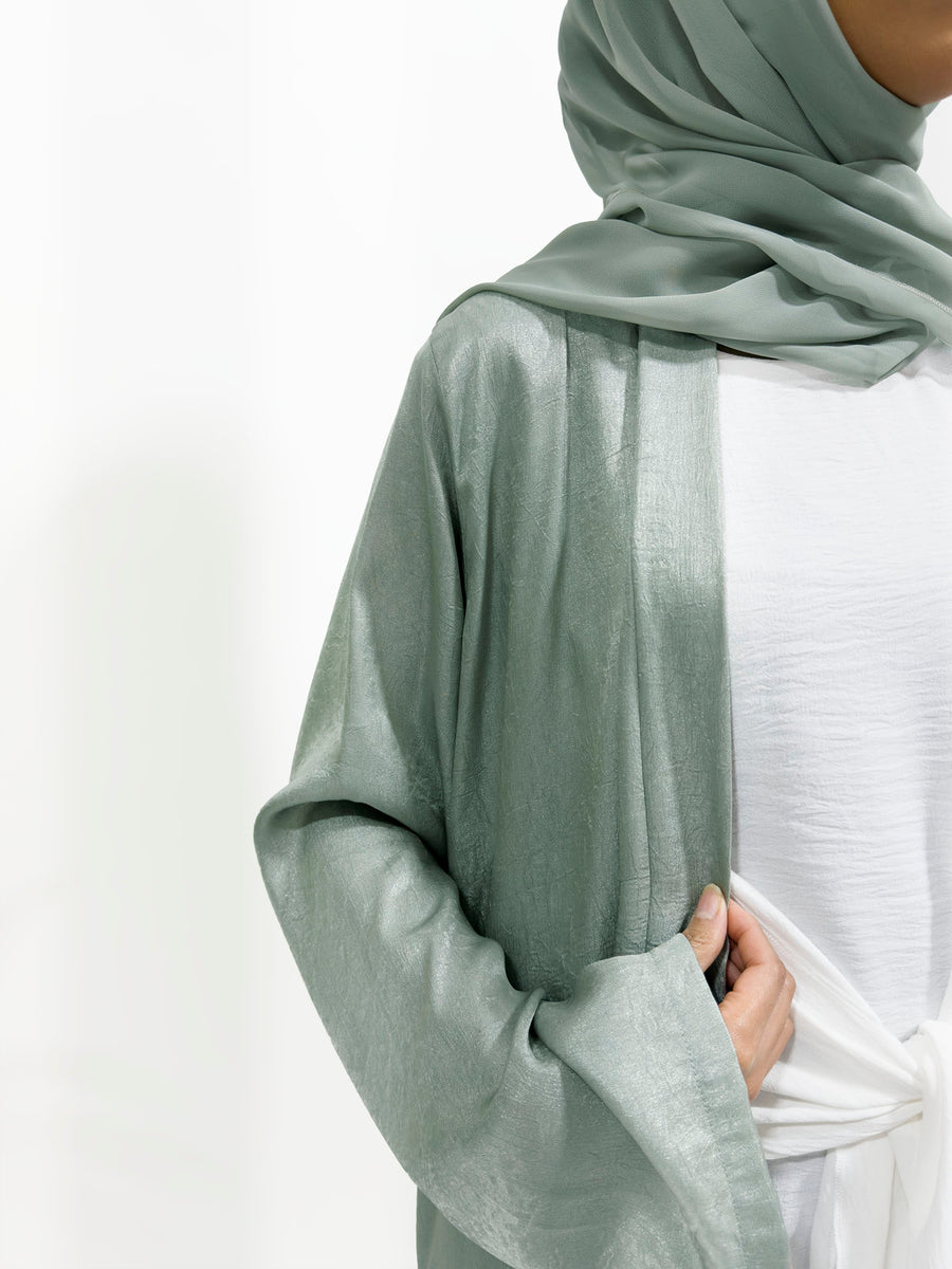 Full-length view of the sage shimmer open abaya set with matching hijab