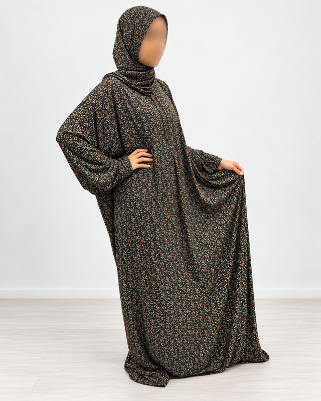 Amani’s black mini-rose floral one-piece prayer dress with attached hijab, no lace, full-length three-quarter view