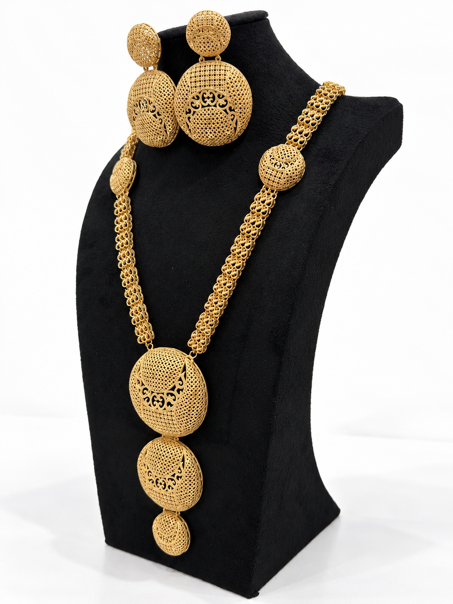Angled view of 1 gram gold-plated layered medallion necklace and earrings