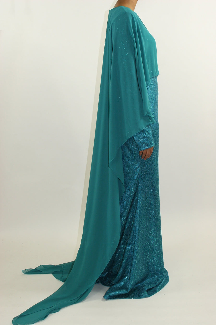 Mermaid-inspired silhouette of the lace and satin occasion dress