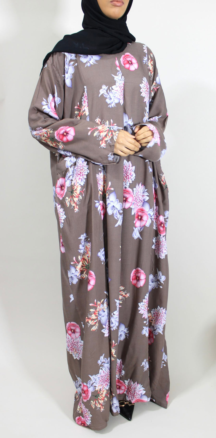 Taupe floral maxi dress showing the soft flowing fit