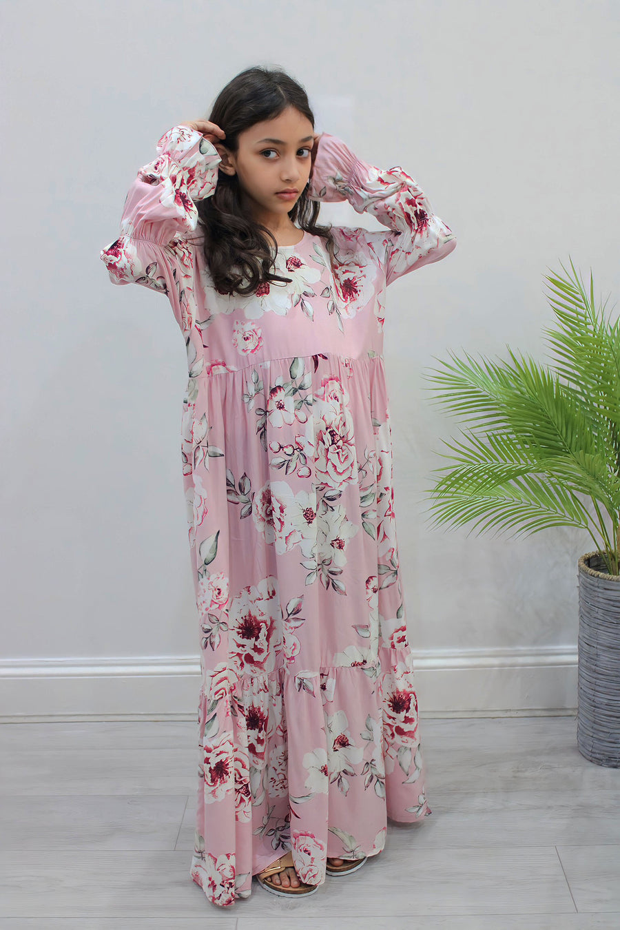 Candy pink floral tiered dress showing the A-line skirt
