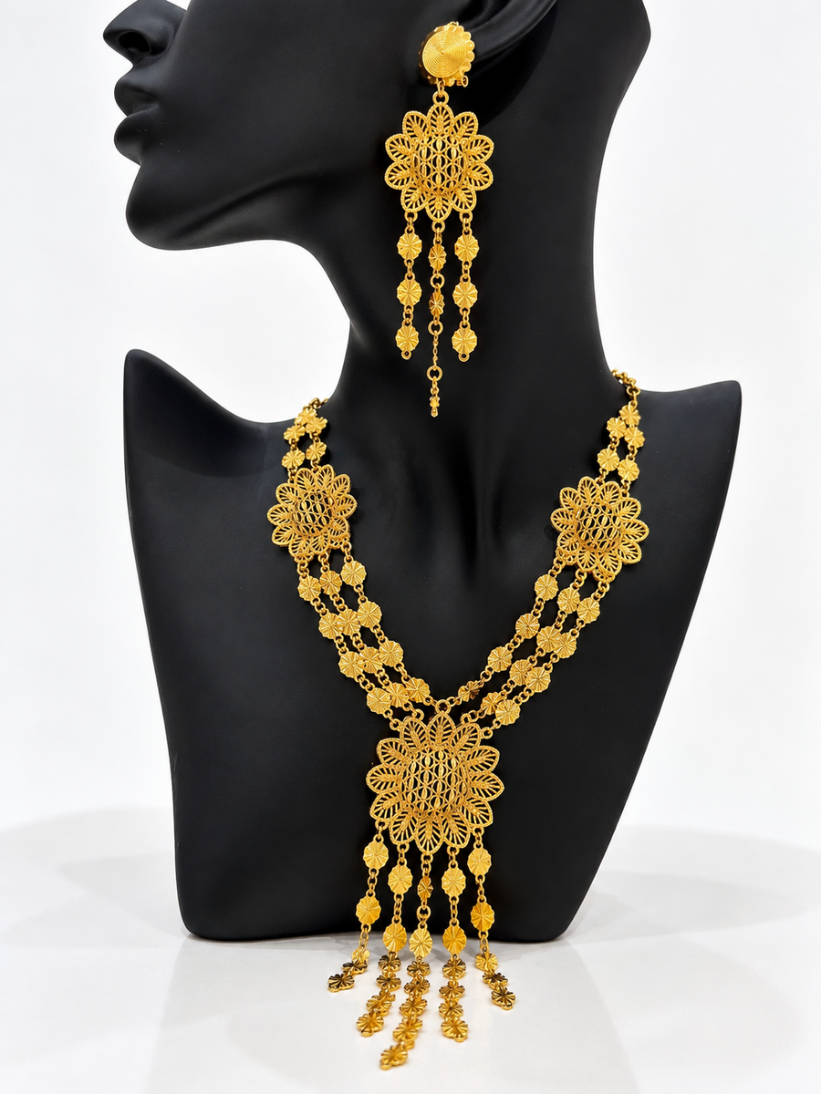 Gold-tone sunburst medallion necklace with matching drop earrings