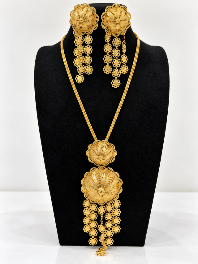 Gold-tone twin rosette necklace with matching long drop earrings