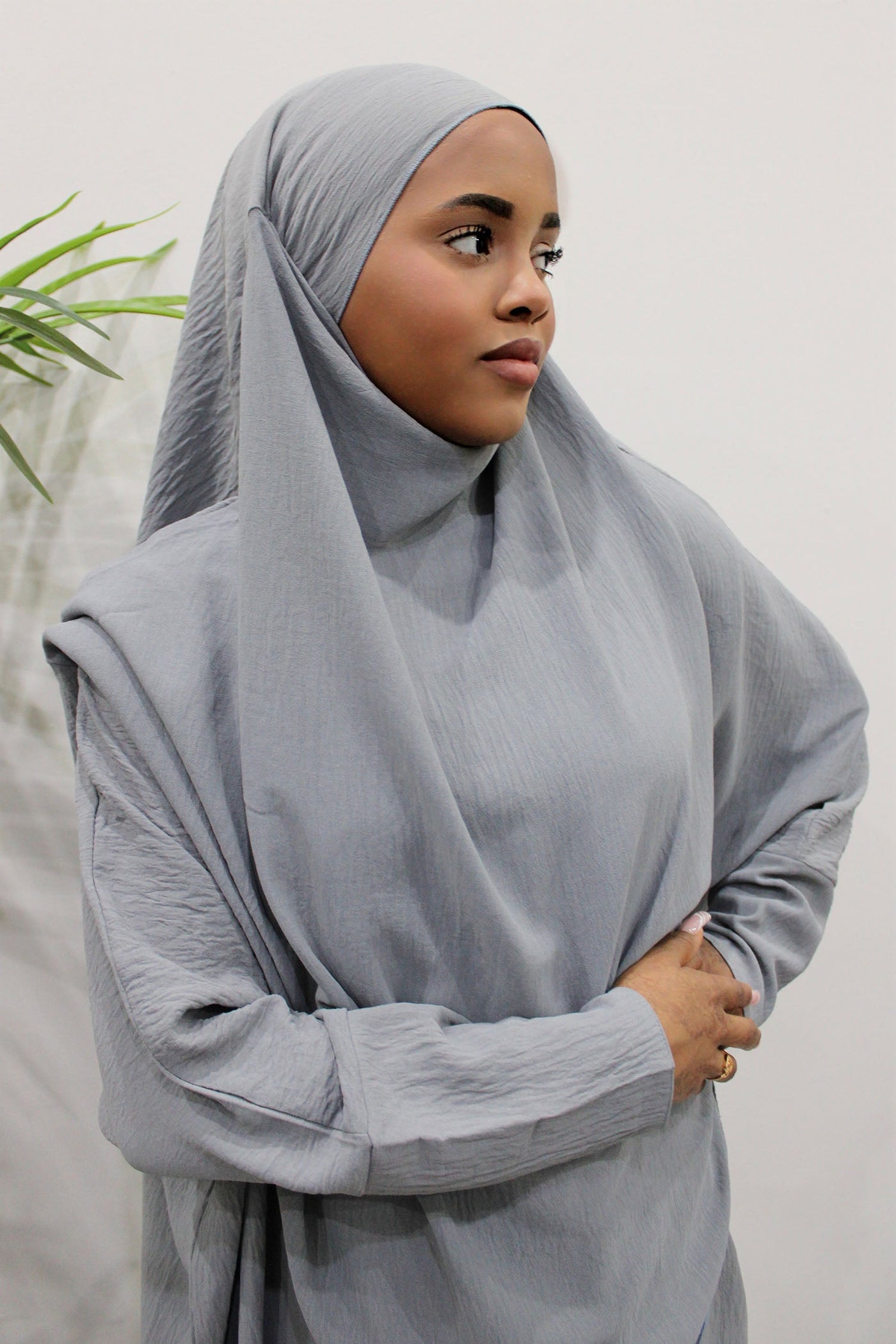 Light grey abaya and khimar styled as an elegant modest fashion outfit