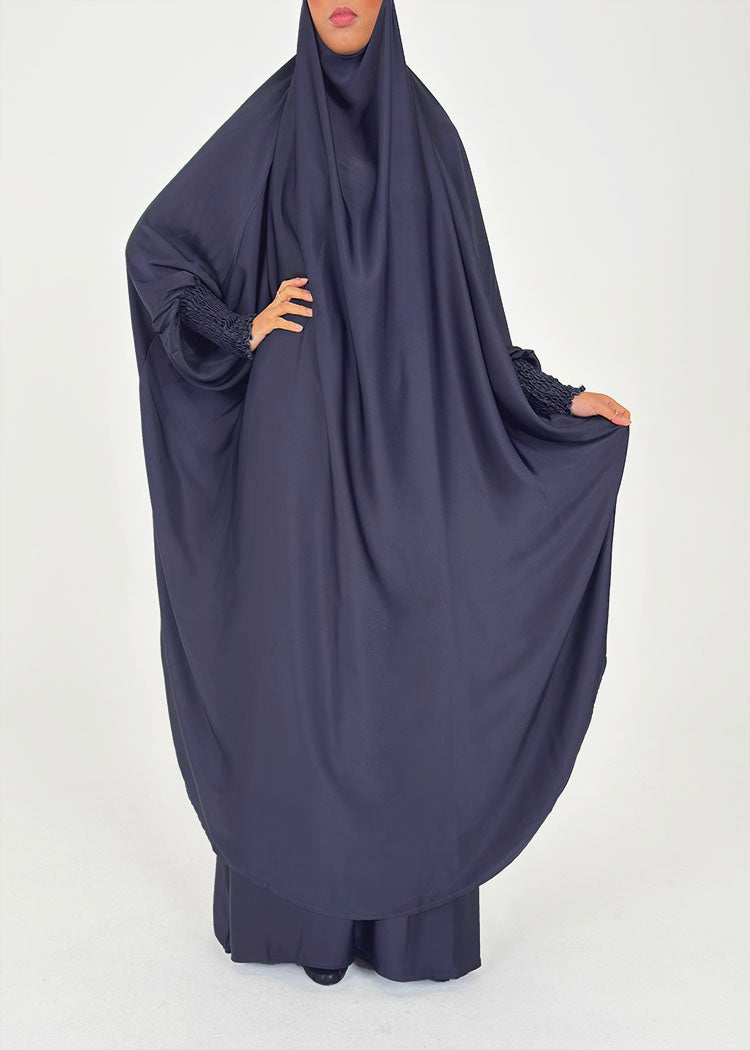 Long modest skirt silhouette in a two-piece jilbab set showing full-length coverage and gentle shape