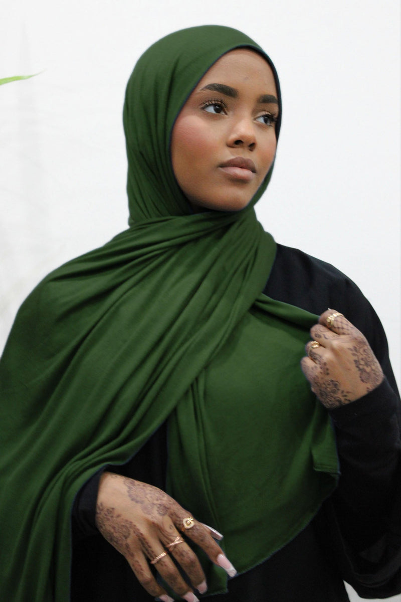 Army green long rectangular hijab styled as a soft shawl