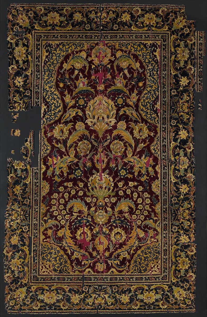 Late sixteenth-century prayer rug with floral patterns, from The Metropolitan Museum of Art.
