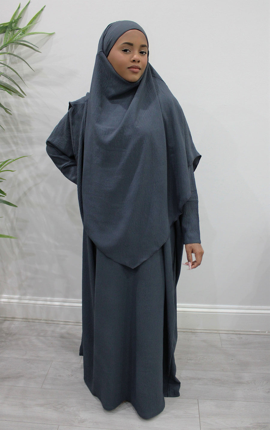 Anchor grey overhead abaya showing the loose fit and crepe drape