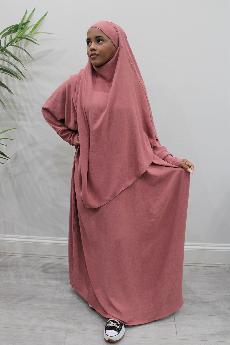 Back of the coral khimar showing the tie straps