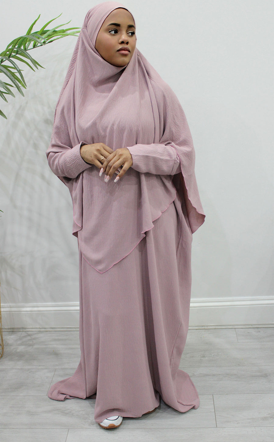 Cotton candy overhead abaya showing the loose fit and crepe drape