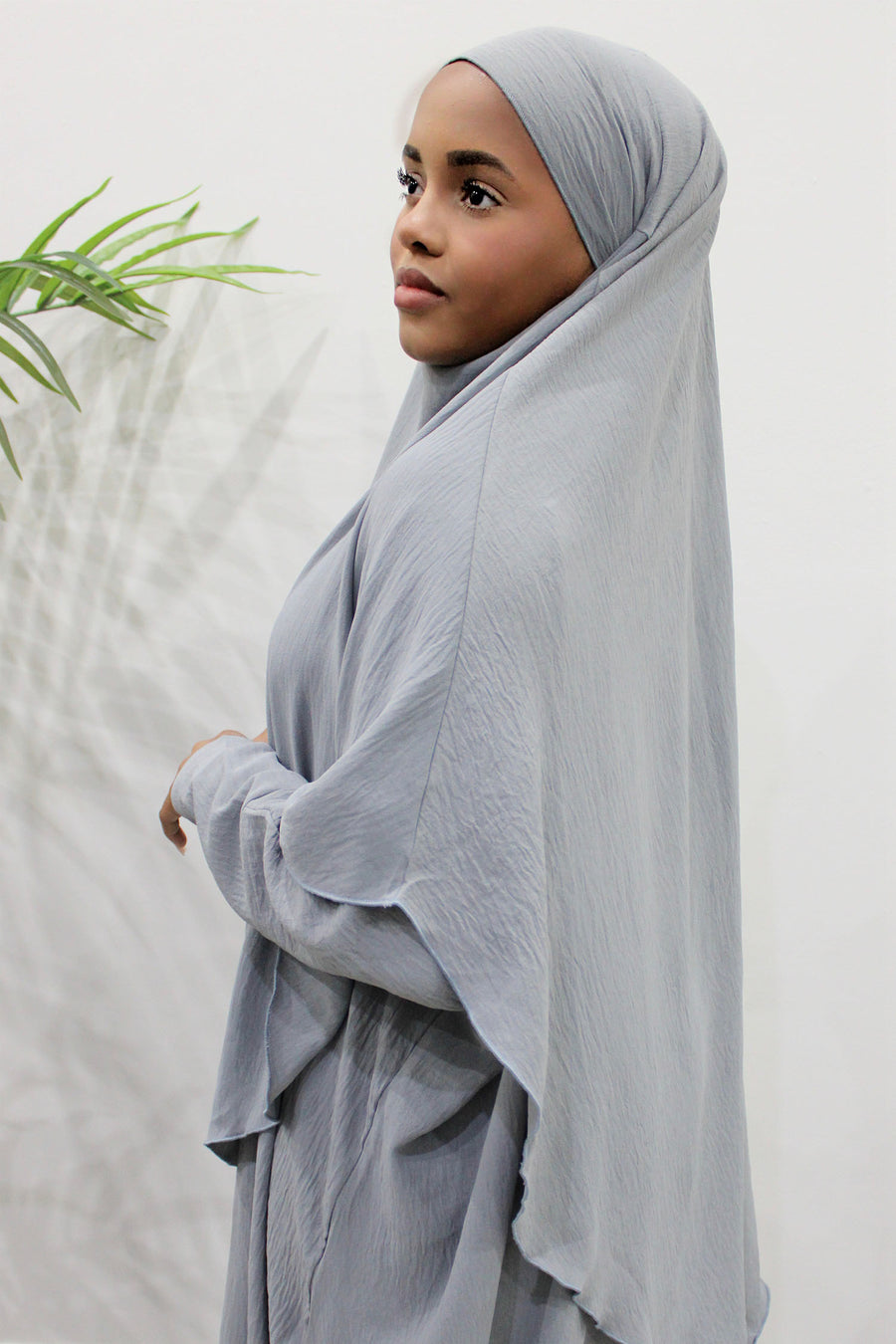 Light grey diamond-shaped khimar showing full chest coverage