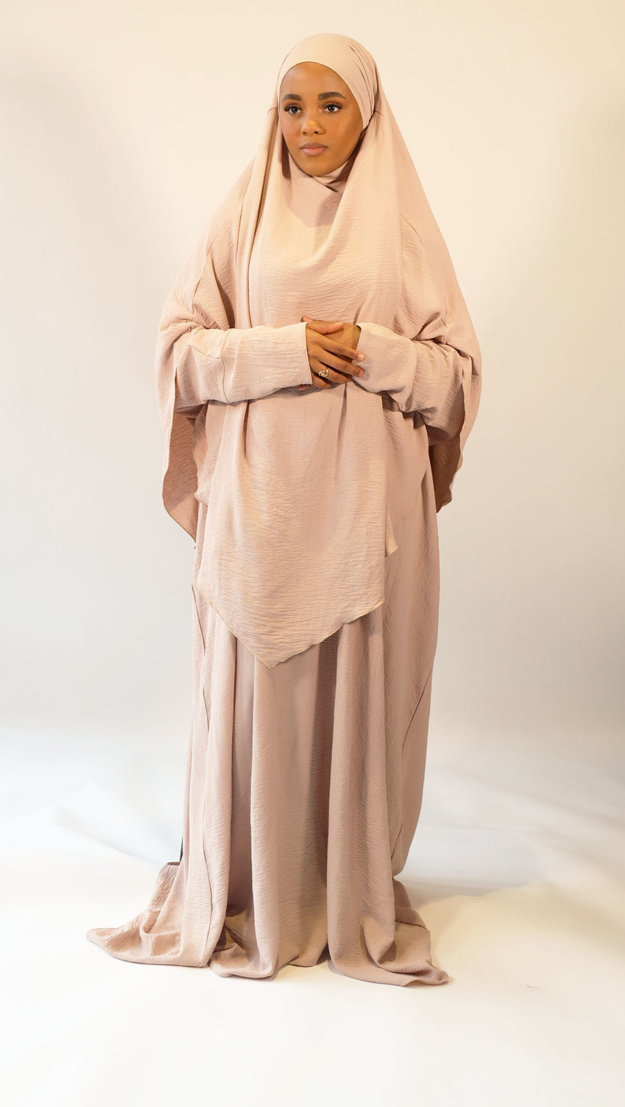 Nude abaya and khimar set styled together