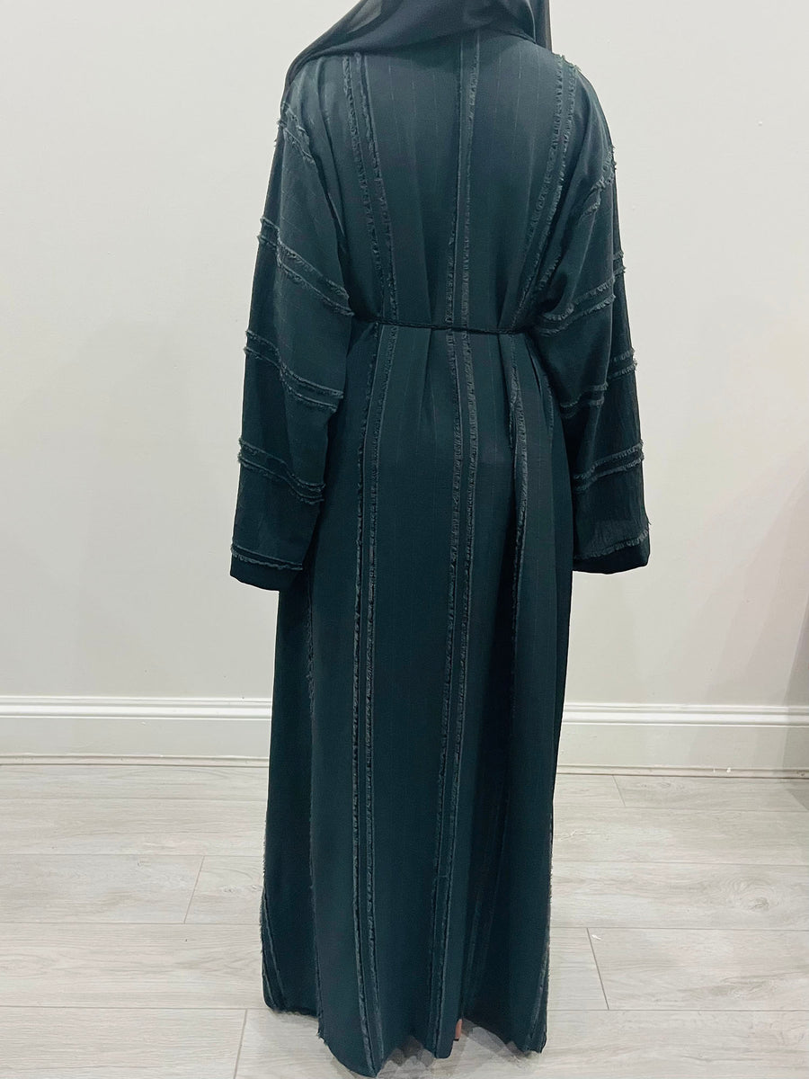 Black open abaya shown with its matching hijab