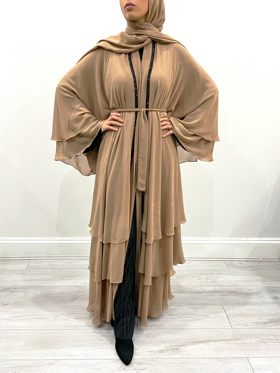 Caramel open abaya shown with its matching hijab and belt
