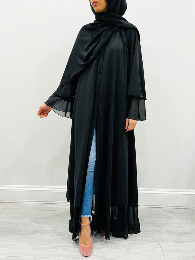 Amani's black-on-black layered chiffon open abaya, front view